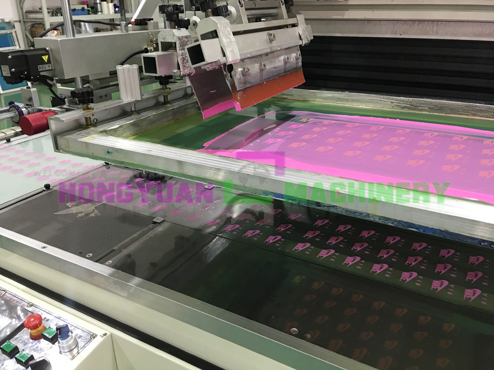 Roll to roll screen printing machine