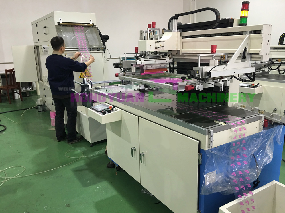 Roll to roll screen printing machine